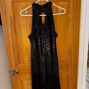 Beautiful, sexy, pre-owned black sequin dress for formal occasions. Size 10